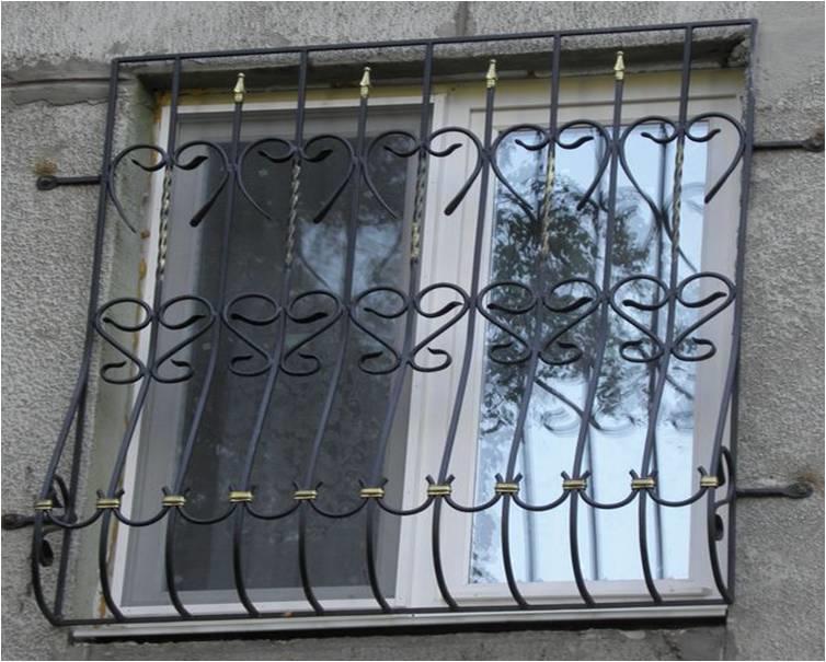 Кованая металлическая решетка на окно МР-025